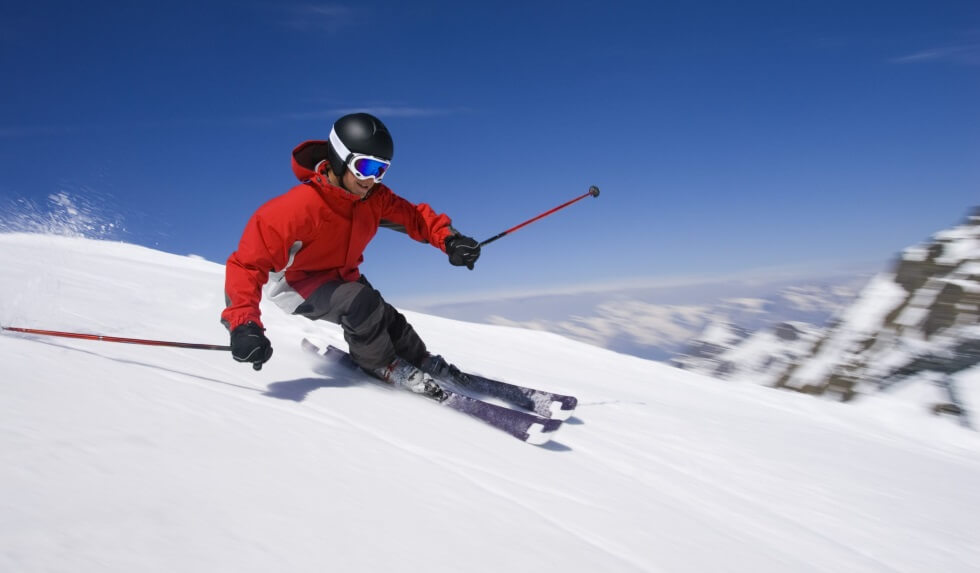 skier skiing downhill